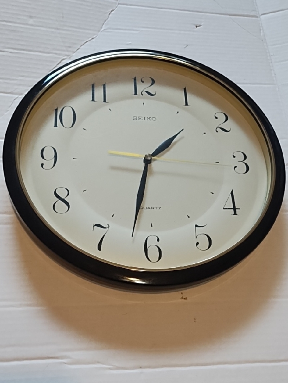 Seiko Black and Cream Wall Clock with Gold Second Hand
